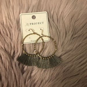 Gold circle dangle earrings with tan tassel fringe